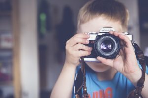 kid taking picture