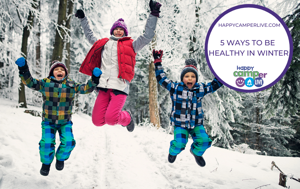 kids jumping in snow