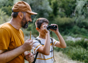 kid and parent birdwatching