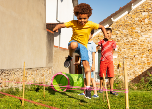 kids running through an obstacle course