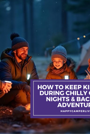 family camping at night around cozy campfire in winter forest