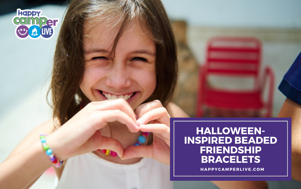 a girl making heart hands wears friendship bracelets