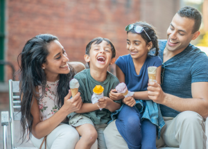 a family eats ice cream cones