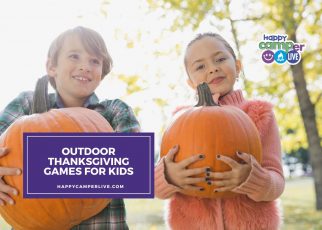 A child holds a pumpkin