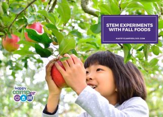 a child holds an apple