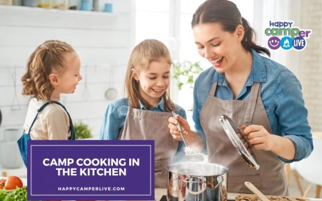 a mom cooks with two kids